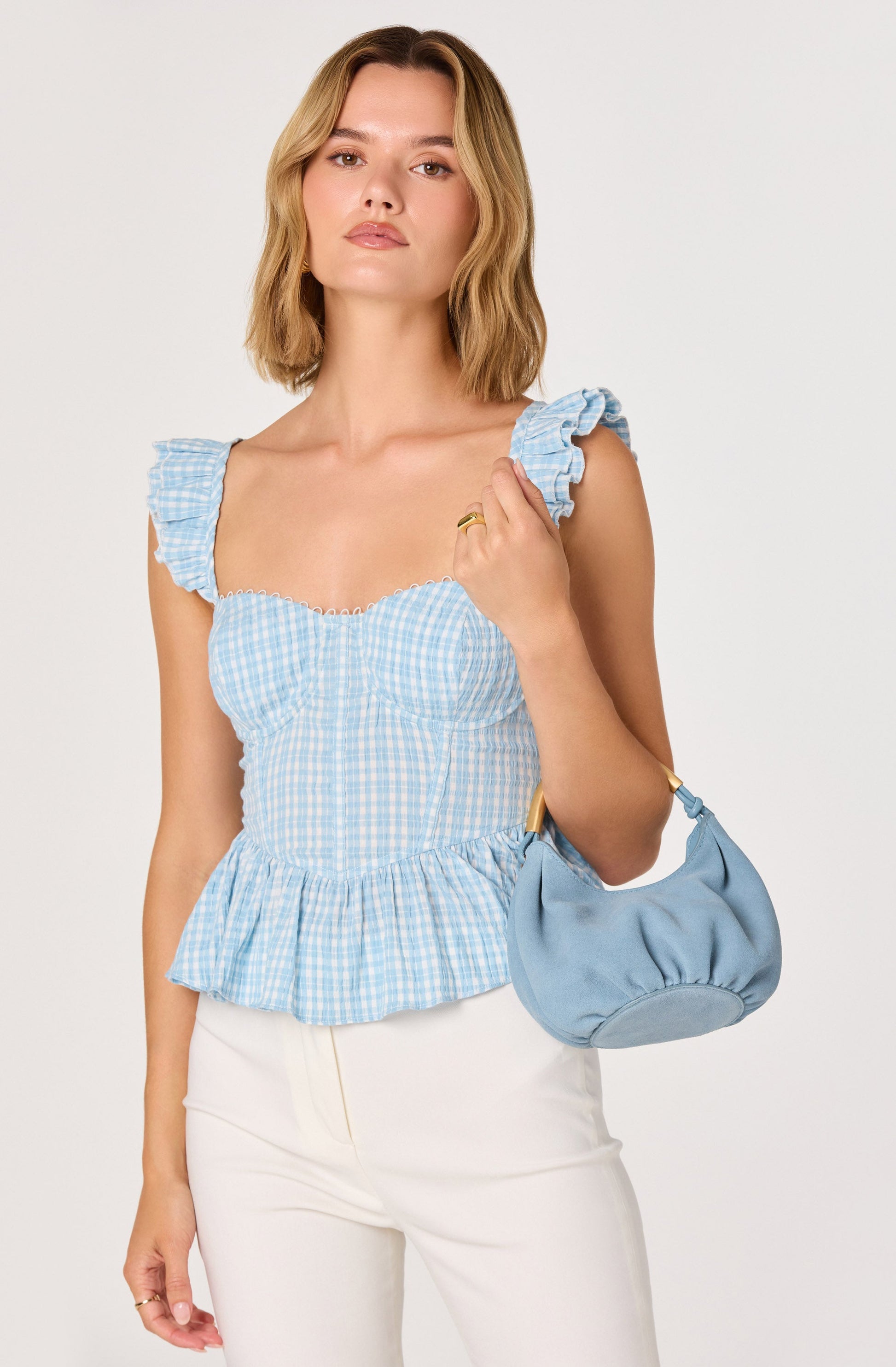 Baylin Eyelet Corset Peplum Top
