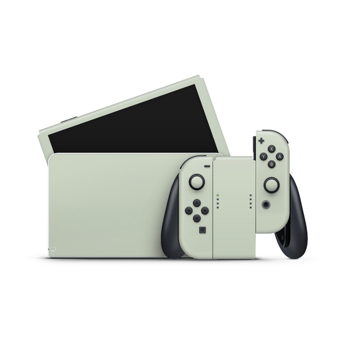 Sage Green Nintendo Switch OLED skin with soft muted green tone on matte vinyl
