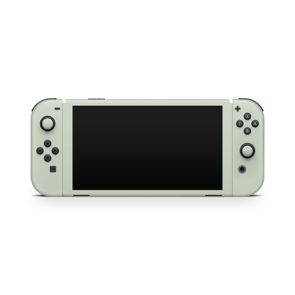 Close-up of Sage Green Switch OLED skin showing earthy herbal hue