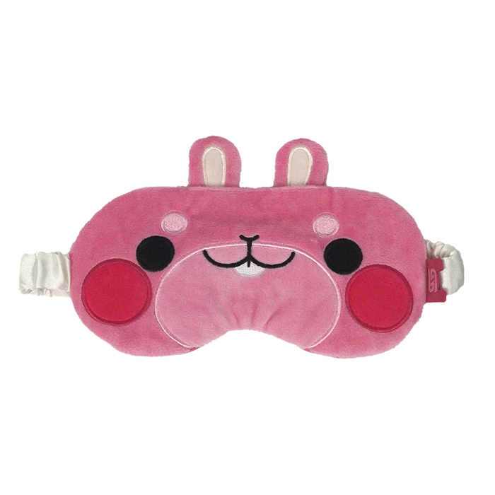 A pink plush sleep mask with a cute cartoon face, featuring bunny ears on top, embroidered facial details, and white elastic straps on both sides, shown against a plain white background.