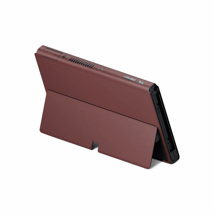 Nintendo Switch OLED with Velvet Maroon skin applied showing full coverage