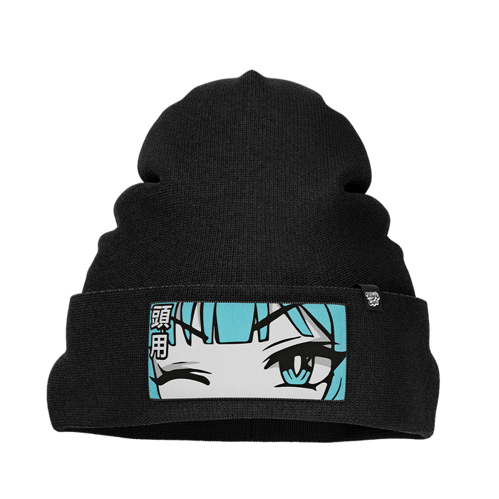 Black knit beanie with a folded cuff featuring a patch of a winking anime face with blue hair and Japanese characters.