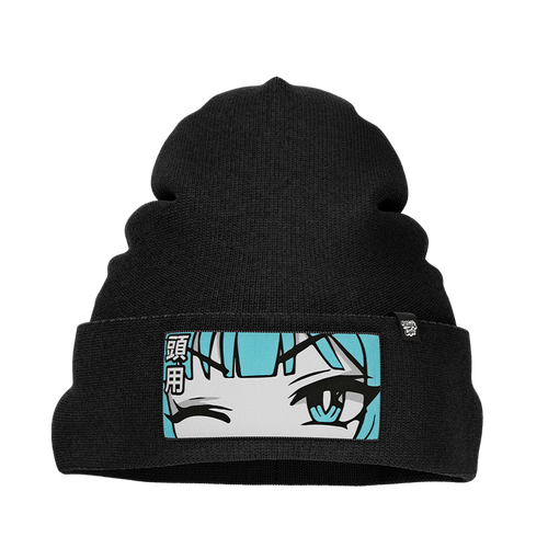 Black knit beanie with a folded cuff featuring a patch of a winking anime face with blue hair and Japanese characters.